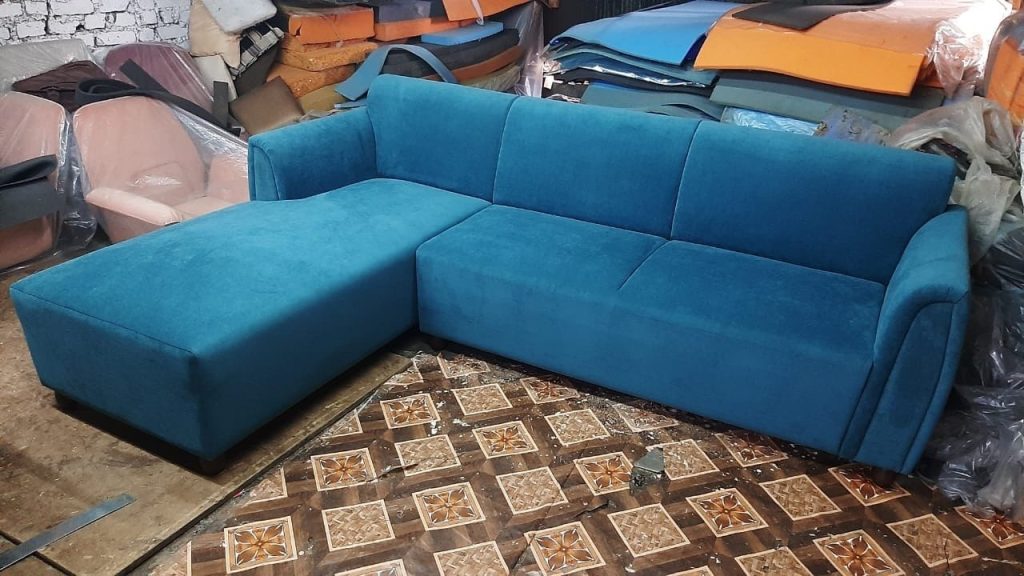 Blue L-Shaped Sofa with Rounded Outer Arms