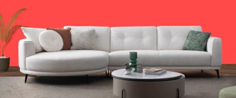 Light Grey Curved Sofa with Slim Dark Base