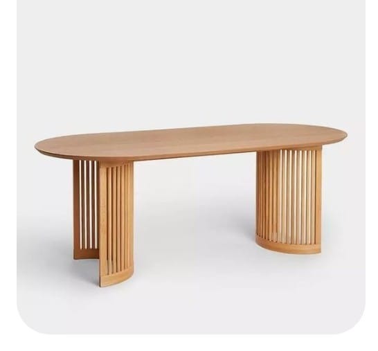 Light Wood-Tone Oval Dining Table with Fluted Pedestals