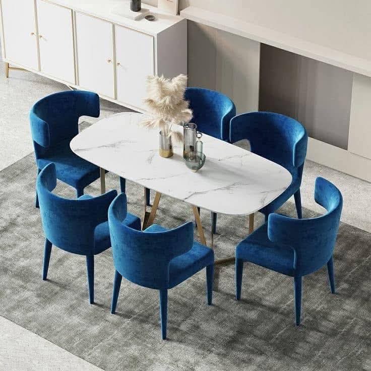White Oval Dining Table with Blue Upholstered Chair Set